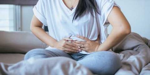 ما هي أعراض الدورة الشهرية؟